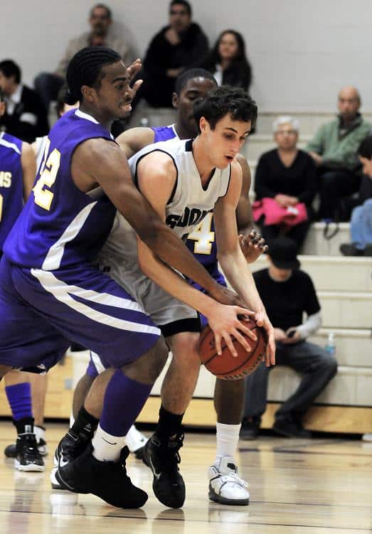 Kevin Cox, right, was a First Team All-Region and Honorable Mention All-State selection in February for the Sedona Red Rock High School basketball team. He also earned three gold medals at the track and field state championships in May.