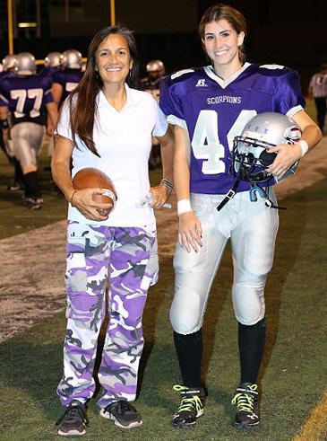 Micheala Cunningham, right, has inspired players and coaches alike as the only active girl football player at Sedona Red Rock High School — including assistant coach Cindy Hauserman. The two will conclude a seven-year football relationship on Senior Night against Hopi High School on Friday, Oct. 30.